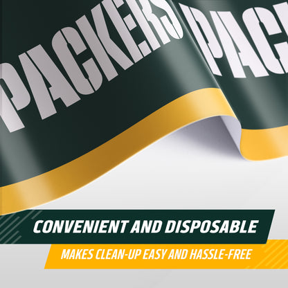 Green Bay Packers plastic tablecloth shown on a table with product dimensions and "Fits Most Tables Between 3-7ft Long" text