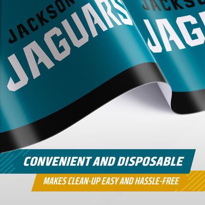 A close-up of a Jacksonville Jaguars tablecloth with bold white lettering with 'JACKSONVILLE JAGUARS' on a teal background, shown with text overlays reading 'CONVENIENT AND DISPOSABLE' and 'MAKES CLEAN-UP EASY AND HASSLE-FREE'.