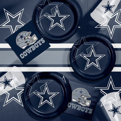 Dallas Cowboys plates, napkins and cups displayed on a matching tablecloth