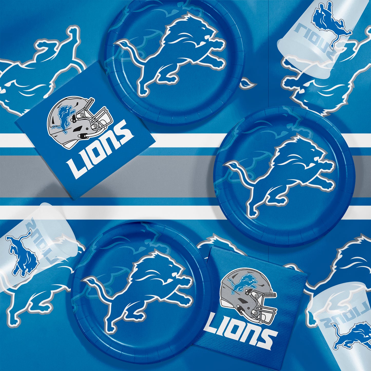 Detroit Lions plates, napkins and cups displayed on a matching tablecloth