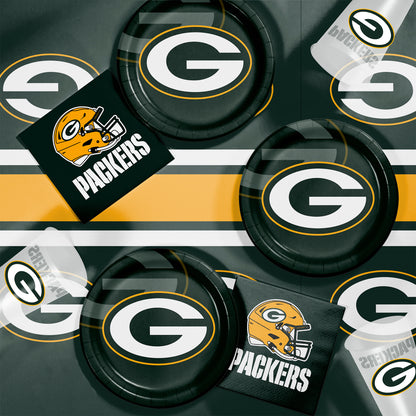 Green Bay Packers plates, napkins and cups displayed on a matching tablecloth