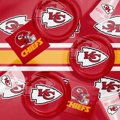 Kansas City Chiefs plates, napkins and cups displayed on a matching tablecloth