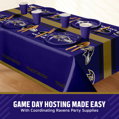 Baltimore Ravens tablescape with plates, napkins, tablecloth, and gold silverware and purple cups. Includes a banner along the bottom with "Game Day Hosting Made Easy" text.