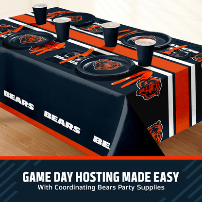 Chicago Bears tablescape with tablecloth, napkins, and plates as well as orange cutlery and navy blue cups. A banner at the bottom features text that says "Game Day Hosting Made Easy".