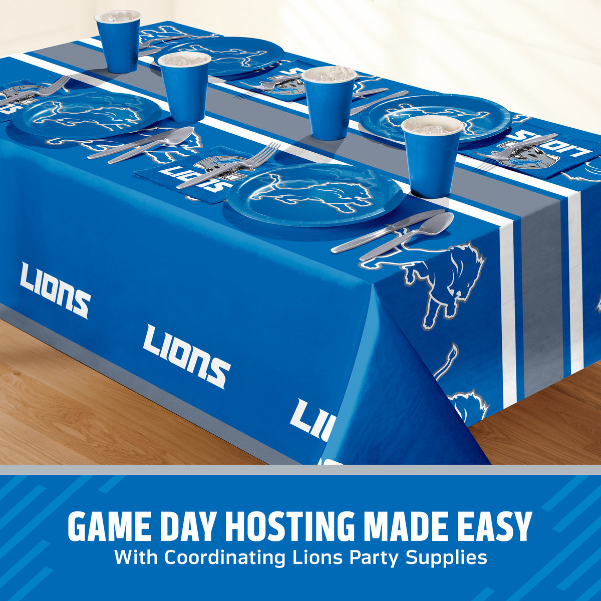 Detroit Lions themed party table setting with a printed tablecloth, matching plates, cups, and utensils, shown on a table with a promotional banner at the bottom that says "Game Day Hosting Made Easy".
