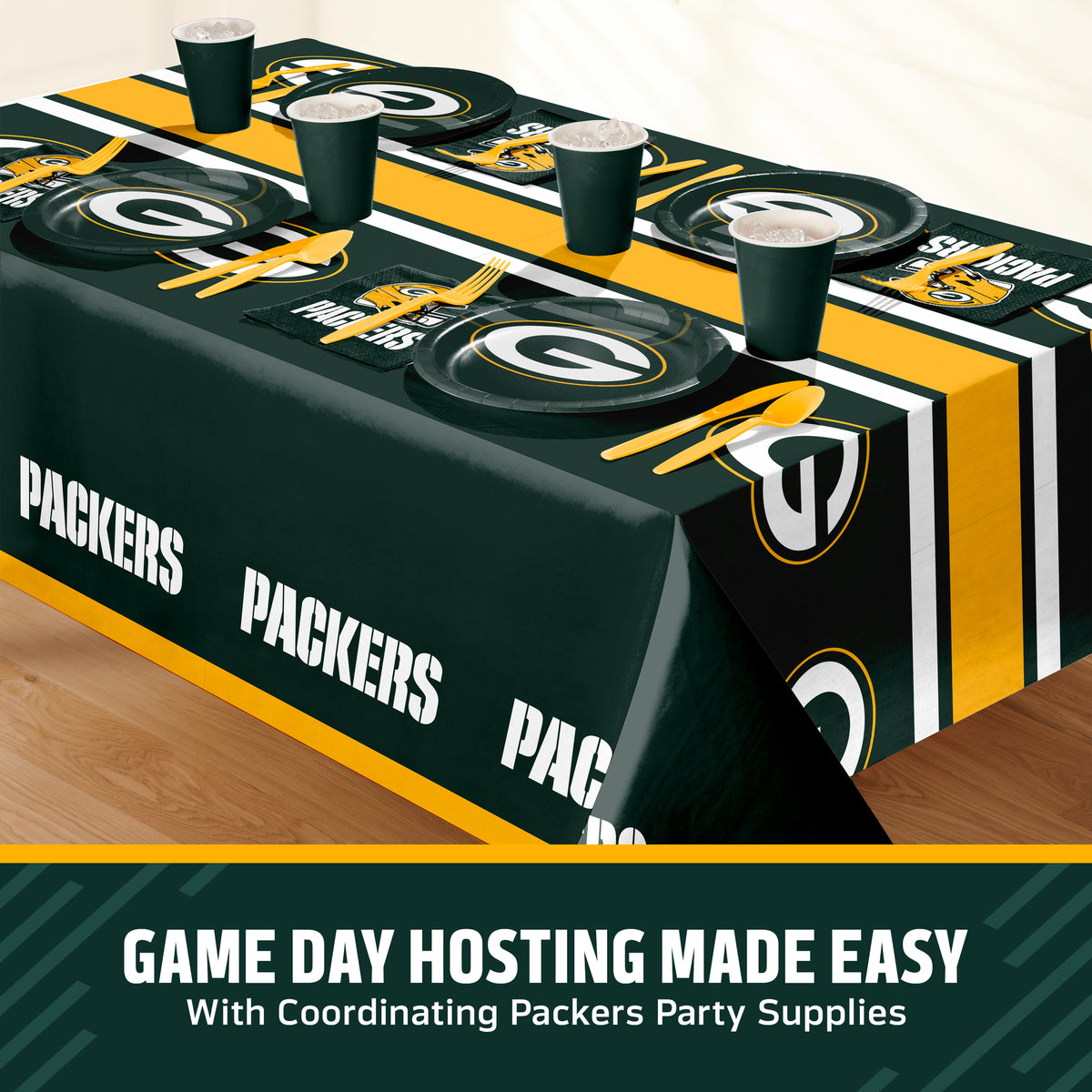 Green Bay Packers themed party table setting with a printed tablecloth, matching plates, cups, and utensils, shown on a table with a promotional banner at the bottom that says "Game Day Hosting Made Easy".