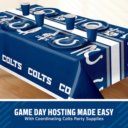 A blue and white Colts-branded party table setting shown on a table, with matching plates, cups, napkins, and a table runner. A promotional banner at the bottom reads 'GAME DAY HOSTING MADE EASY With Coordinating Colts Party Supplies.