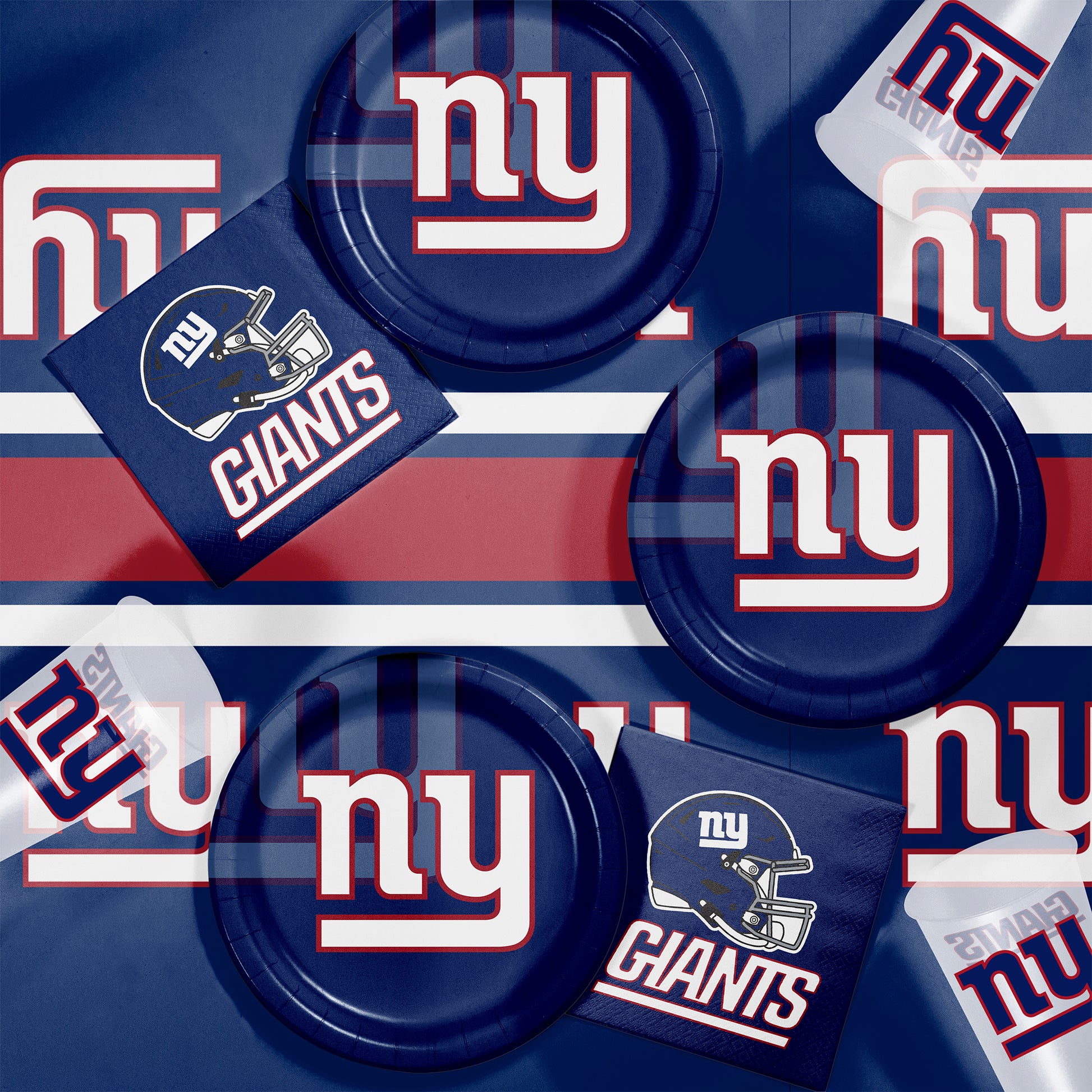 New York Giants plates, napkins and cups displayed on a matching tablecloth