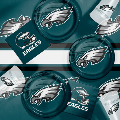 Philadelphia Eagles plates, napkins and cups displayed on a matching tablecloth