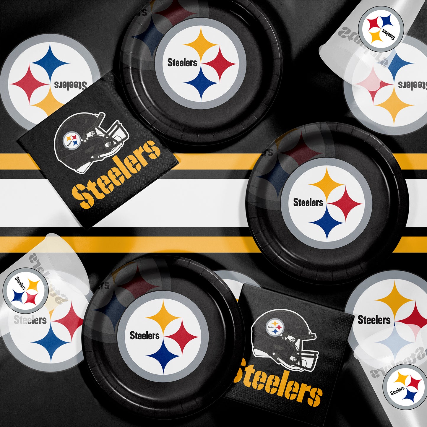 Pittsburgh Steelers plates, napkins and cups displayed on a matching tablecloth