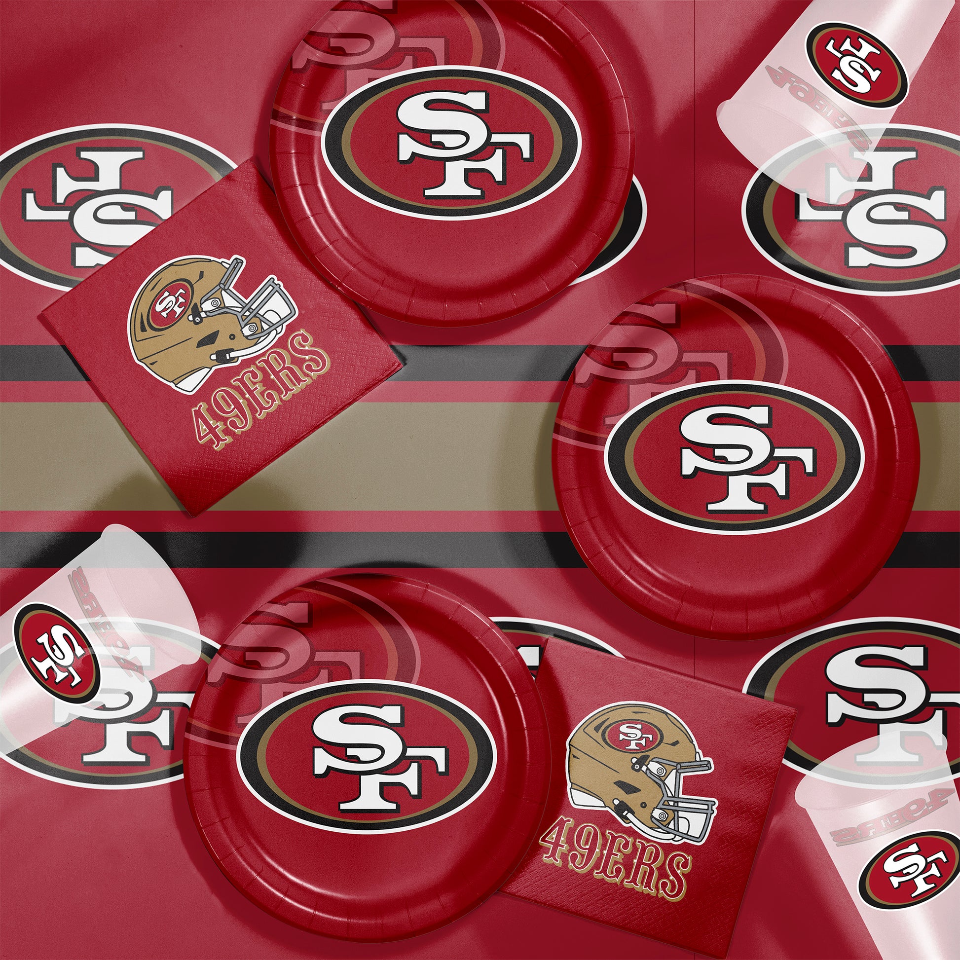San Francisco 49ers plates, napkins and cups displayed on a matching tablecloth